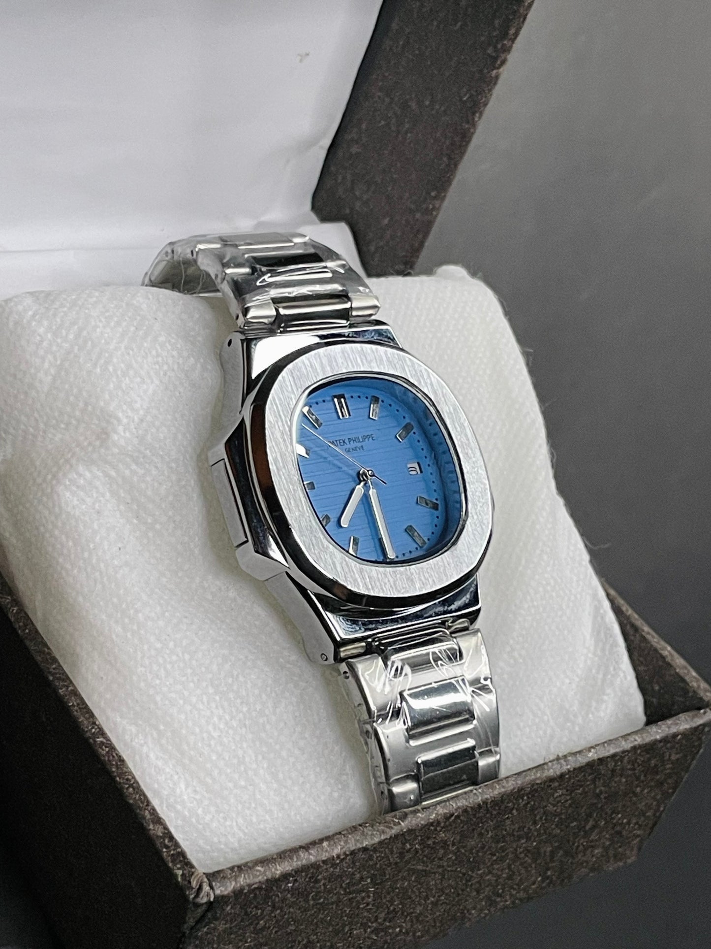 PP Silver with blue dial and date