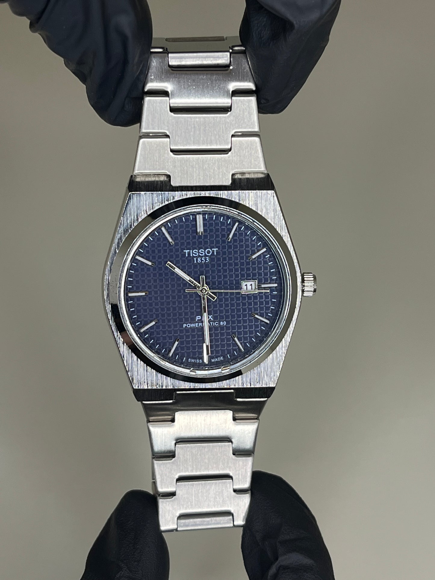 Tissot with blue dial and silver chain