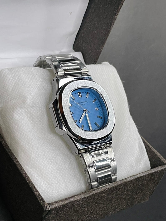 PP Silver with blue dial and date